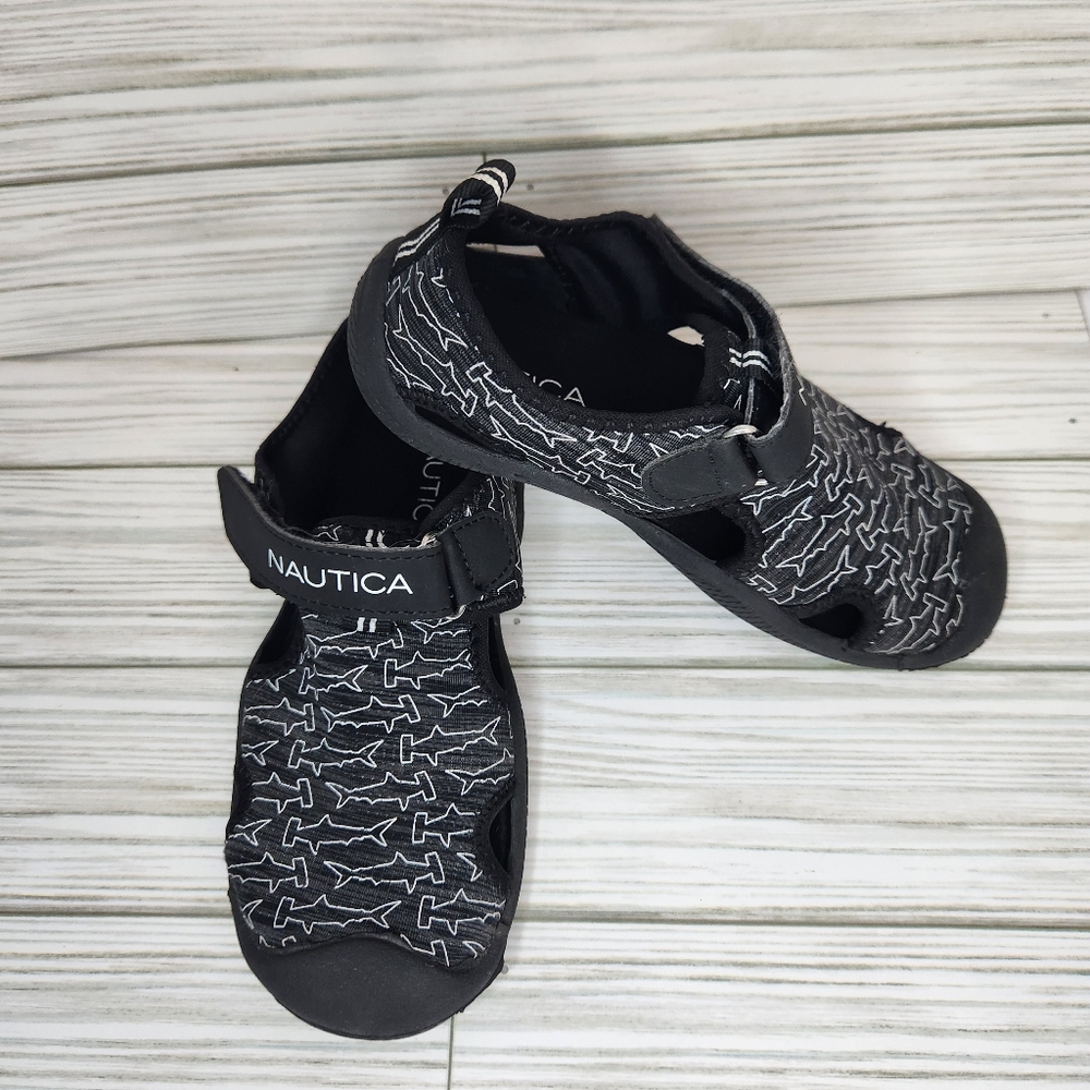 Nautica kids closed toe water shoes. Size 11 little kid. Black shark print.